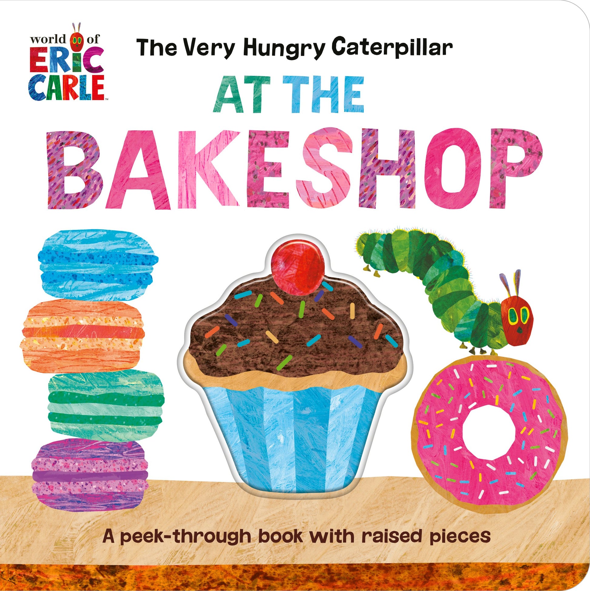 The Very Hungry Caterpillar at the Bakeshop: A Peek-Through Book with Raised Pieces by Carle, Eric. ISBN 9780593661154.